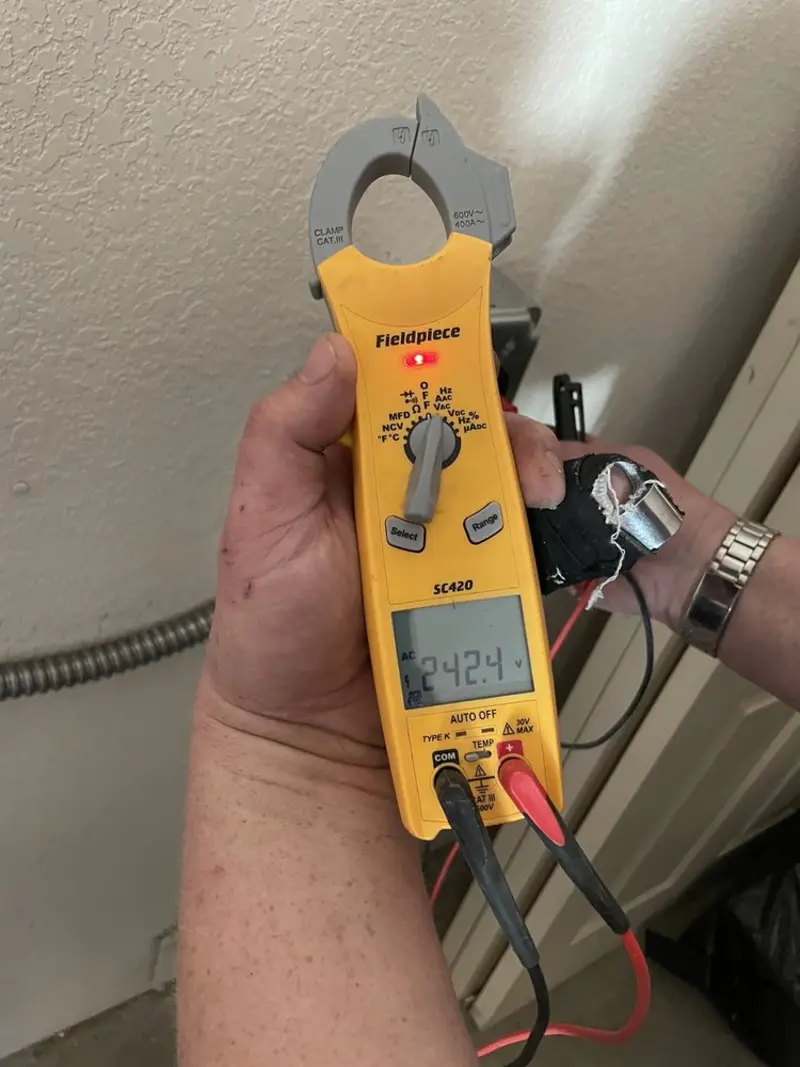 Voltage testing with clamp meter during Hot Tub / Pool Electrical Wiring in Ramsey
